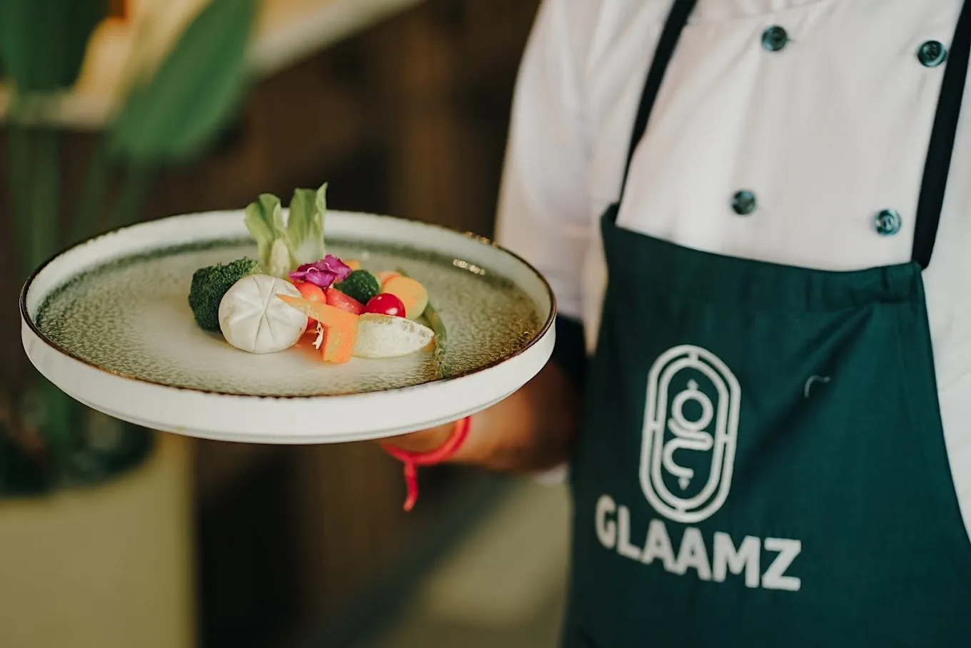 Chef plating a dish