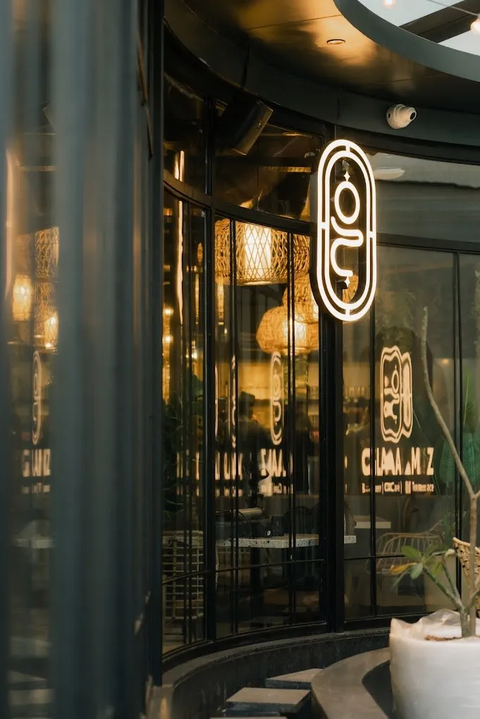 Glaamz entrance with the neon emblem