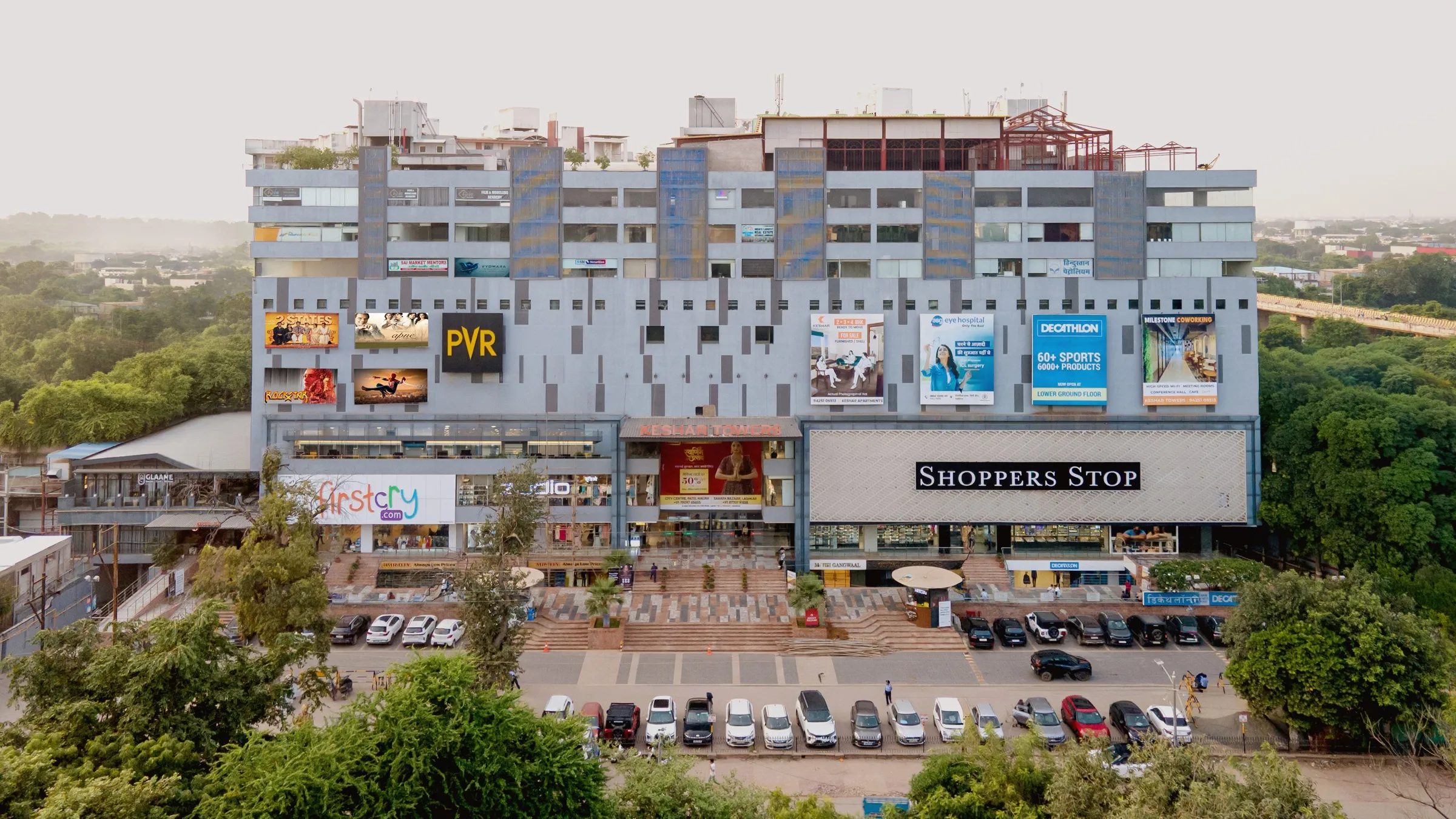 Keshar Towers from the air: the full front with PVR, Shoppers Stop and the office floors