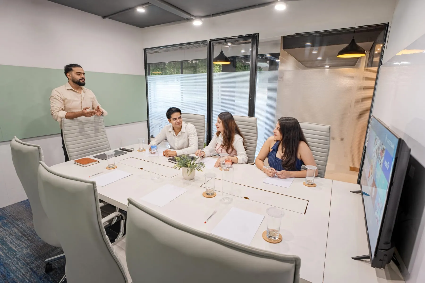 A meeting in the MileStone boardroom