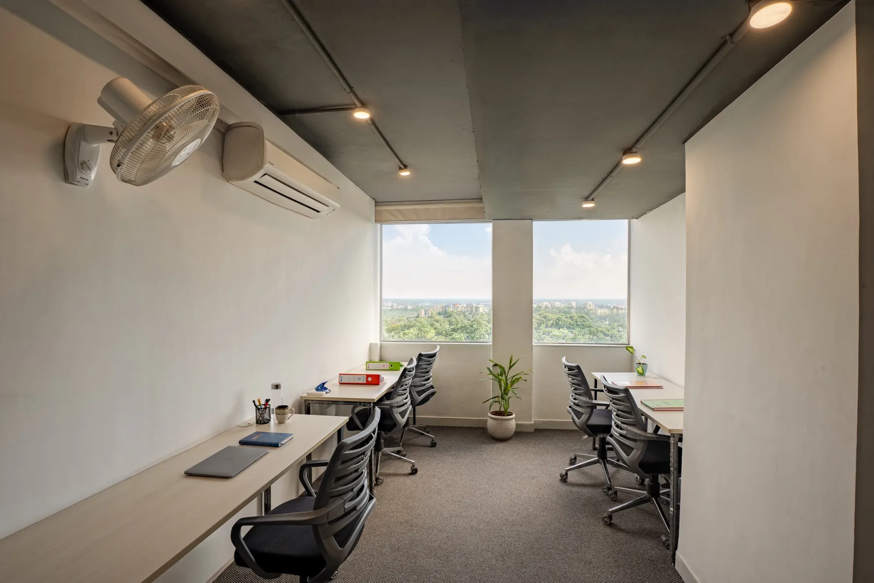 Furnished cabin with a window view at MileStone Coworking
