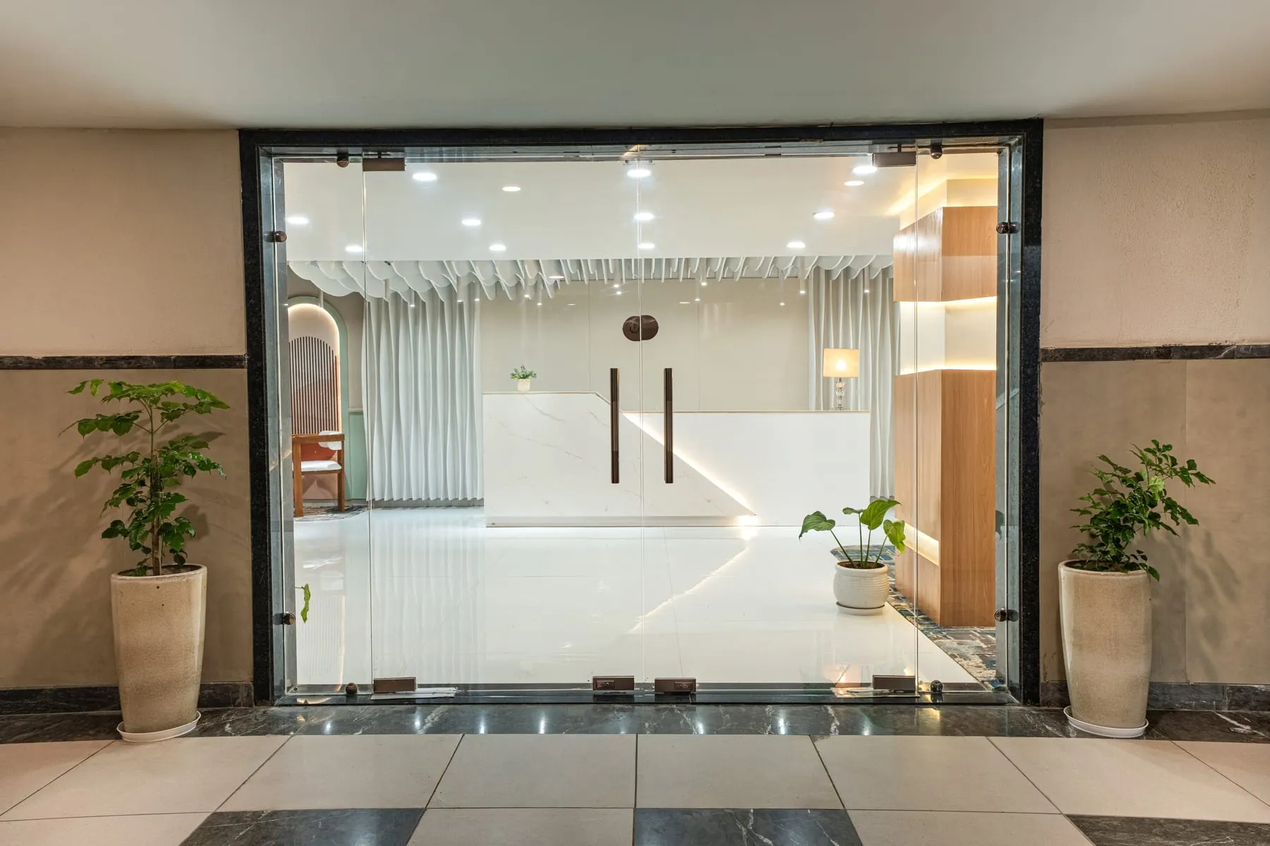 Glass entrance from the lift lobby